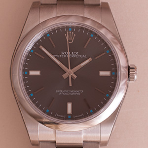 Rolex Oyster Perpetual 39 Dark Rhod. 