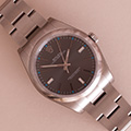 Rolex Oyster Perpetual 39 Dark Rhod. 